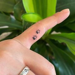 Tiny Paws Finger Tattoo